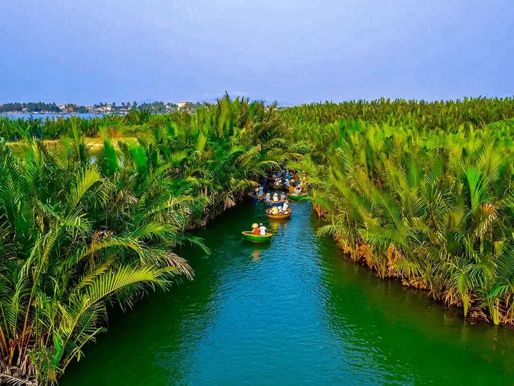 Lush Ben Tre coconut groves in Mekong Delta on a scenic Ben Tre Travel banner by Legend Travel Group.